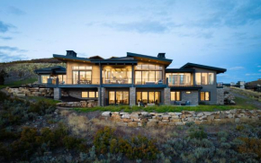 Luxury home away from home with multiple outdoor spaces, 2 hot tubs, pool table, home gym, and more
